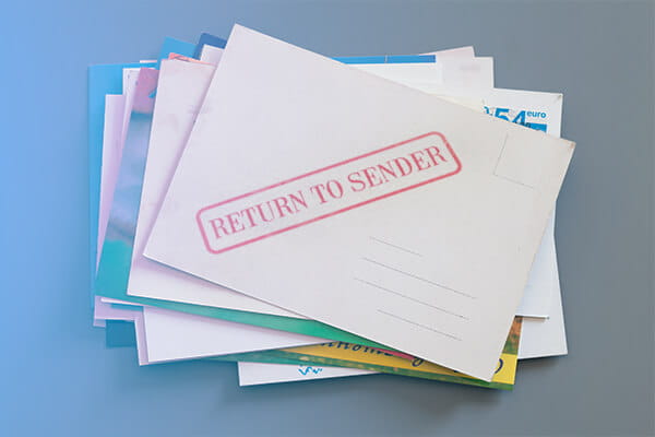 Pile of colorful cards on gray background